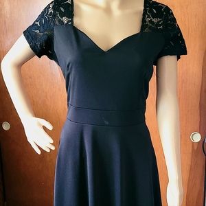 Black dress with floral top. Size XXL.